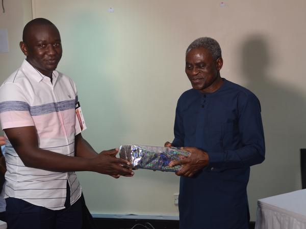 A gift being presented at YPF Dinner (2024 Edition)