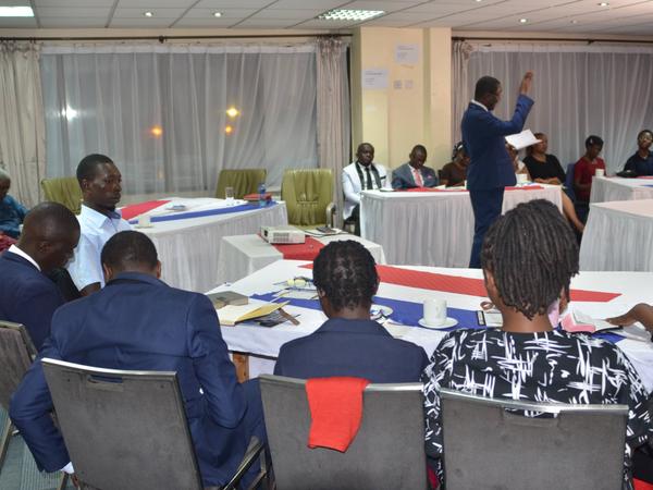 Members seated at tables during the programme at YPF Dinner (2024 Edition)