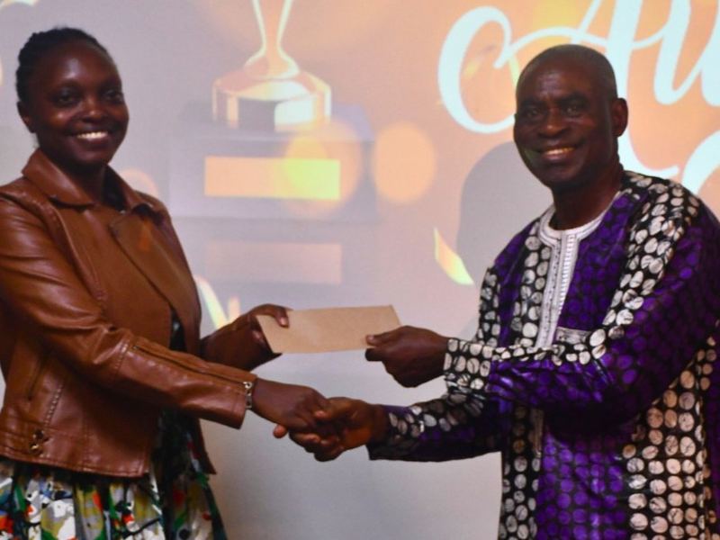 A YPF member receiving a certificate at the 2025 dinner